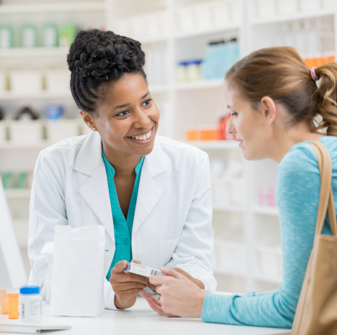 Pharmacist talking to a patient